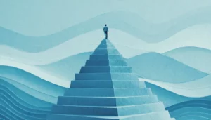 A turquoise pyramid chart with a man standing on top