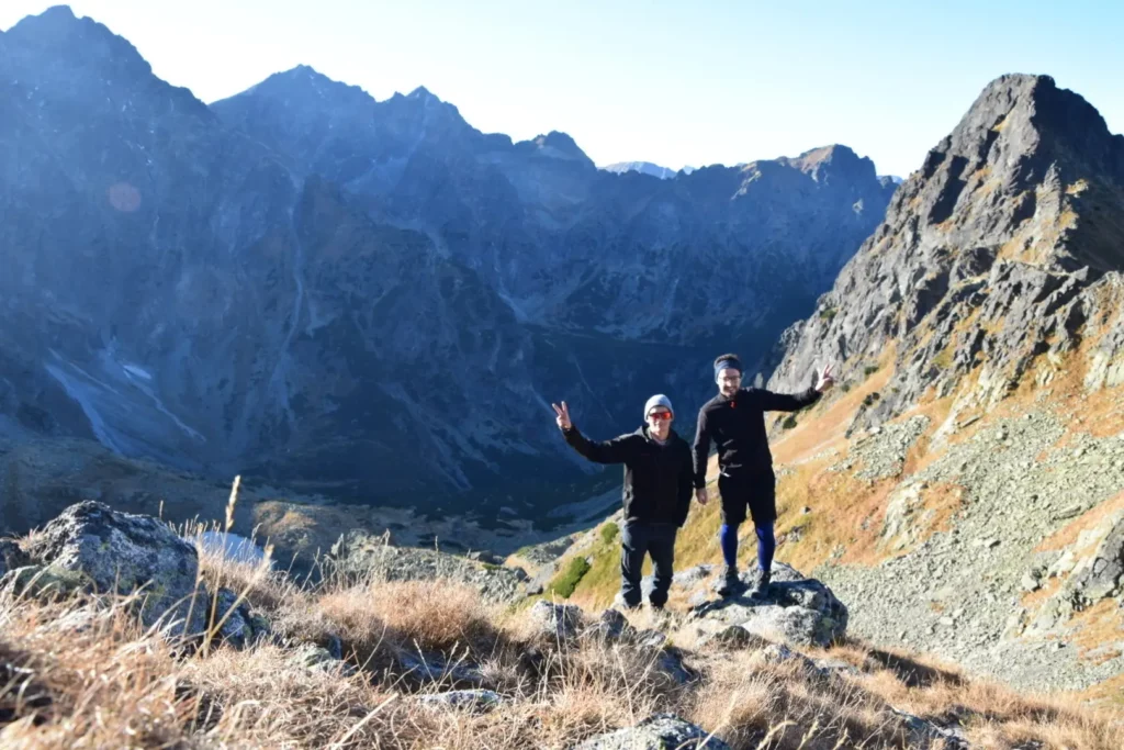 Two Black Label team members hiking in the Mountains.