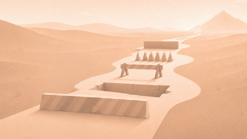 Road through a desert landscape with multiple blockades, representing barriers between data and decision